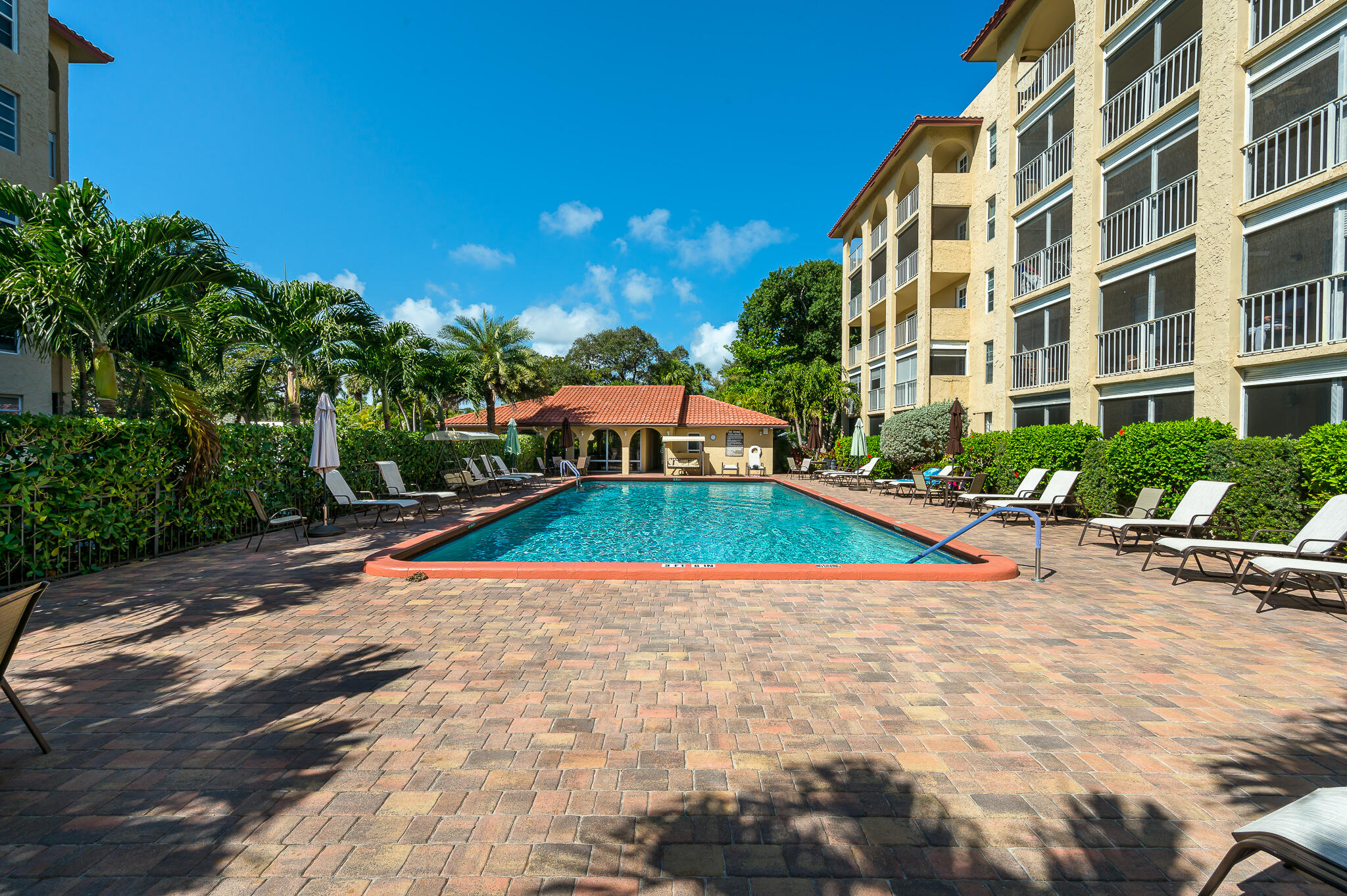 1111 South Ocean Boulevard, Unit 420 Boca Raton, FL 33432 - Photo 19 of 23 a view of pool with outdoor seating