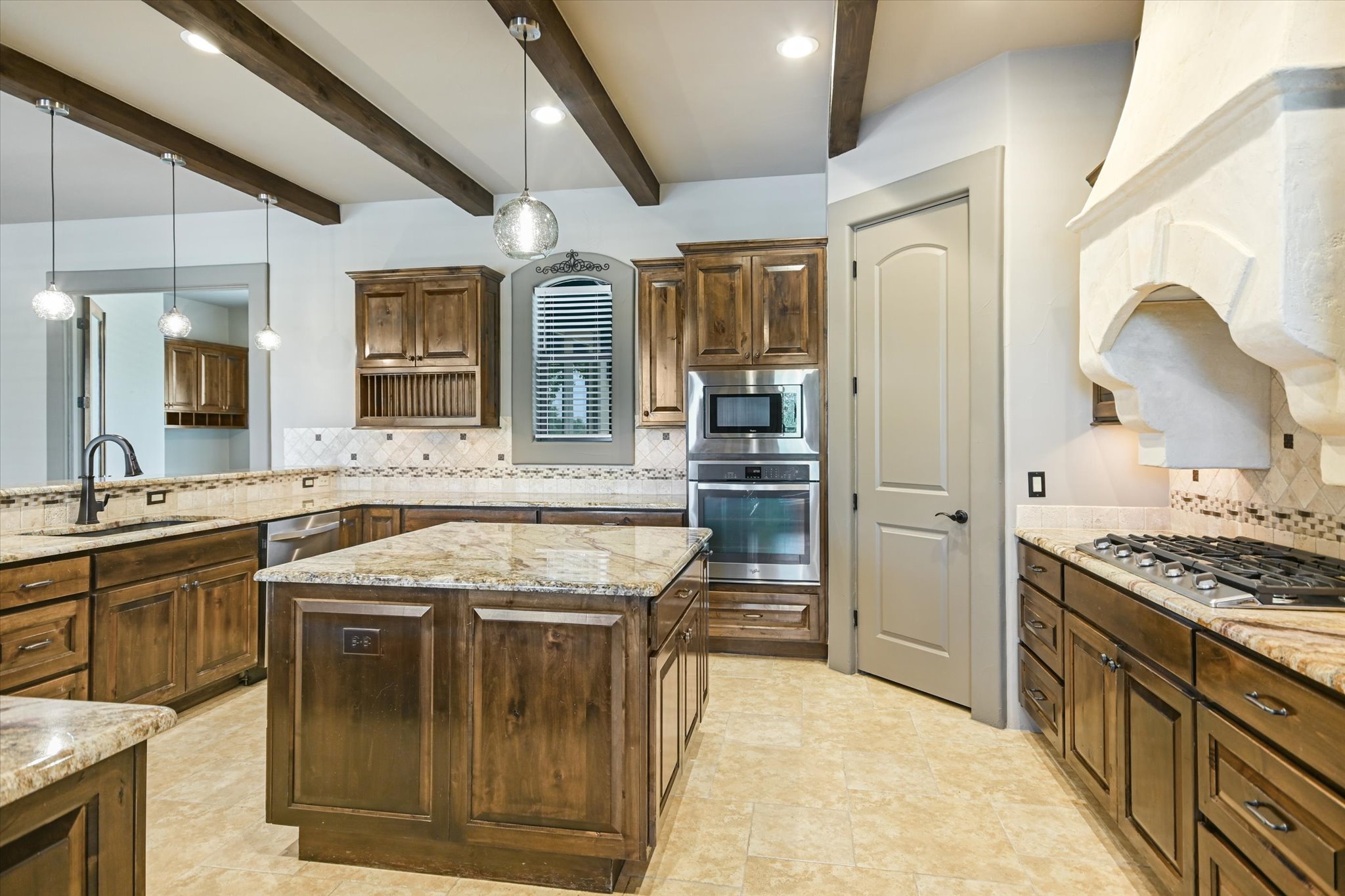 228 Puzzle Pass Spring Branch, TX 78070 - Photo 14 of 35 High beamed kitchen ceilings bring it in for a warm and welcoming feeling.