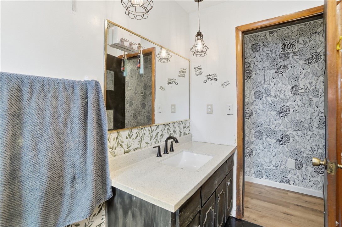 290 Ginghamsburg Road Tipp City, OH 45371 - Photo 29 of 49 This bathroom features an elegant vanity with a sleek countertop.