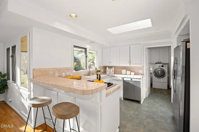 a bedroom with a bed and lamp