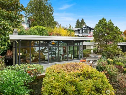 a view of a cafe with sitting area