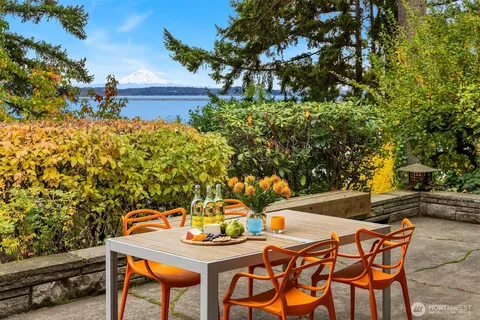 a kitchen with a sink and a large window