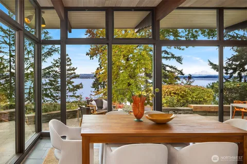 a view of an outdoor dining space with furniture