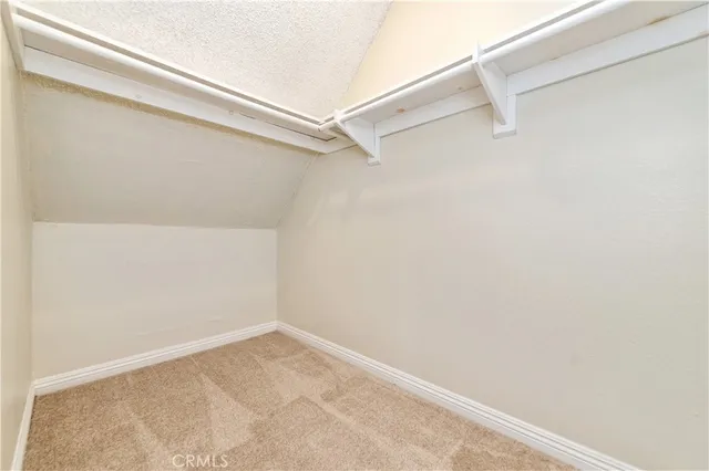 a view of small space with racks on the wall