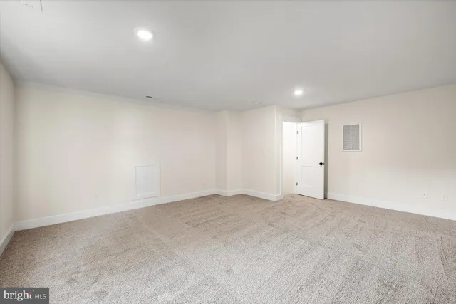 a view of house with backyard space and garden