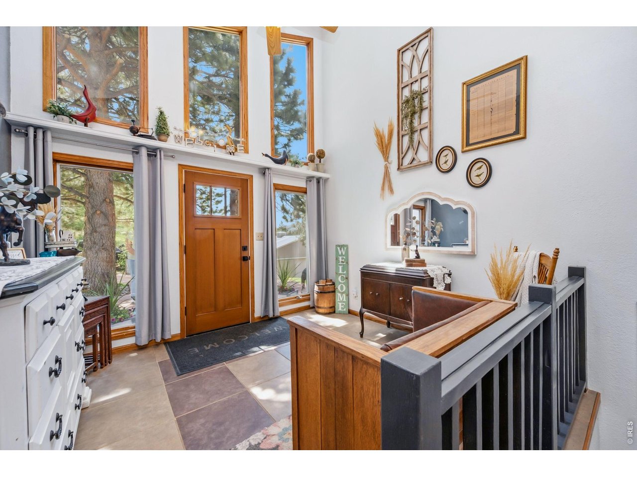 1154 Spring Valley Road Bellvue, CO 80512 - Photo 7 of 31 Floor to ceiling windows in foyer