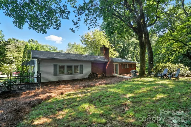 a house that has tree in front of it