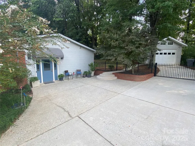 a front view of a house with garage