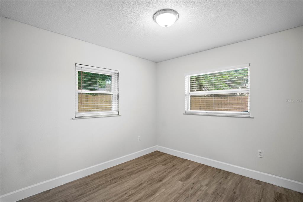 4138 Westgate Road Orlando, FL 32808 - Photo 12 of 29 an empty room with a window