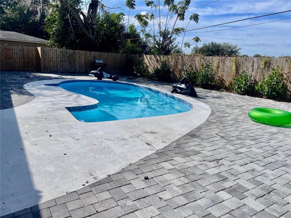 4138 Westgate Road Orlando, FL 32808 - Photo 28 of 29 a view of a backyard