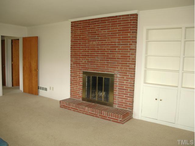 808 Ralph Drive Cary, NC 27511 - Photo 5 of 8 LIVING ROOM WITH NATURAL FIREPLACE