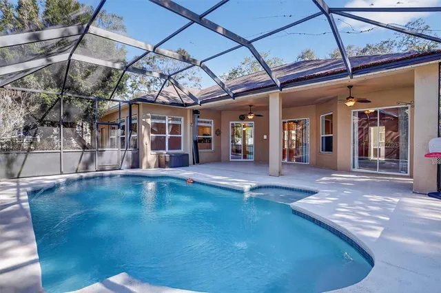 a view of a living room with a large window