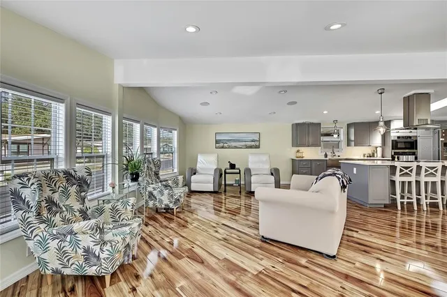 a living room with furniture and a table