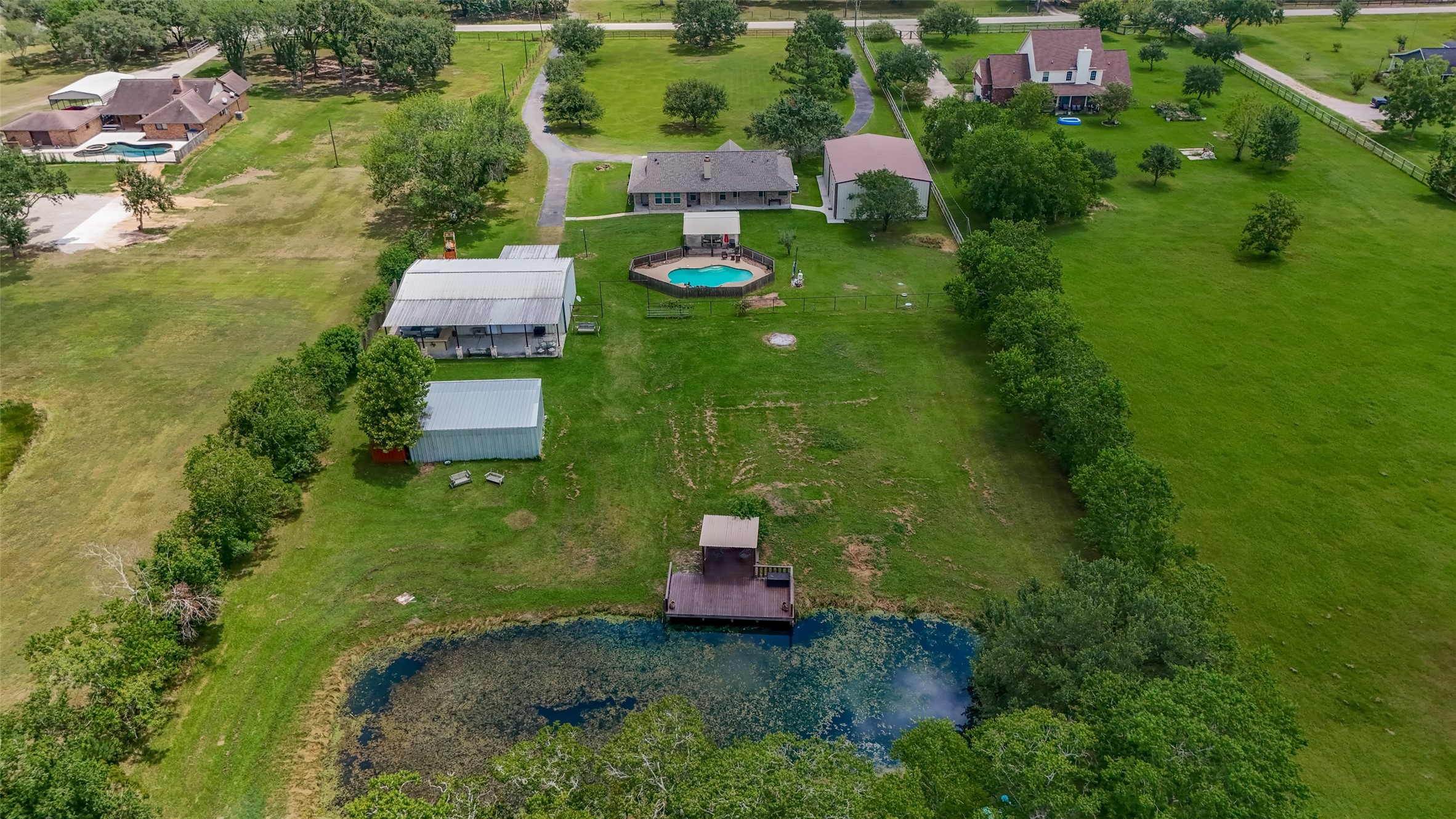 1030 Ginger Street Santa Fe, TX 77517 - Photo 46 of 50 an aerial view of a house with a yard basket ball court and outdoor seating