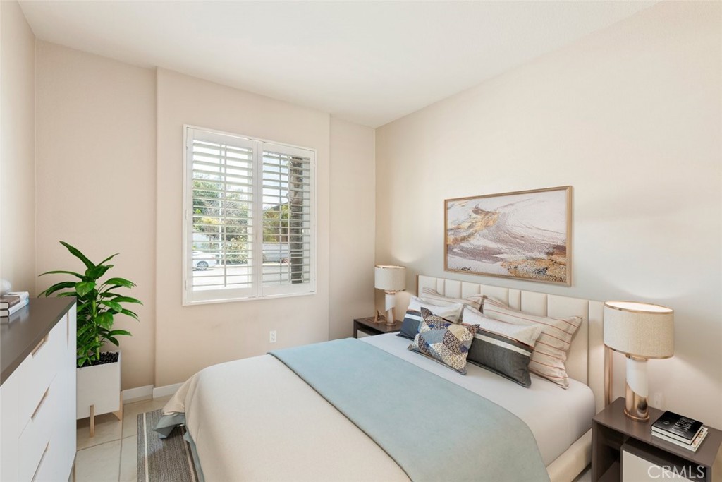 46123 Drymen Avenue Temecula, CA 92592 - Photo 20 of 42 a bedroom with a bed and a potted plant