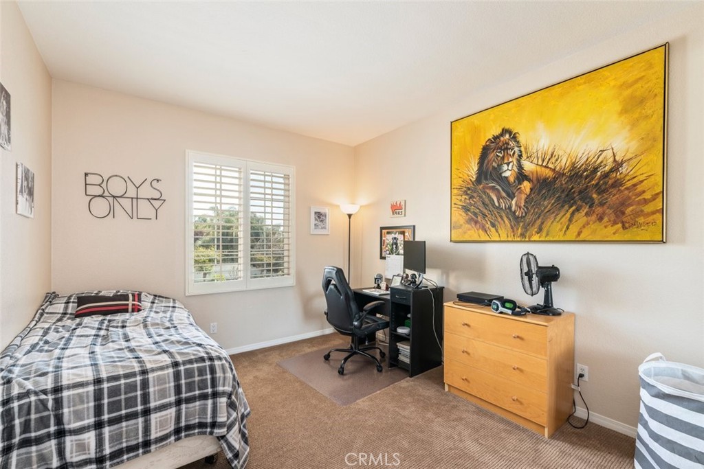 46123 Drymen Avenue Temecula, CA 92592 - Photo 25 of 42 a bedroom with a bed and a window