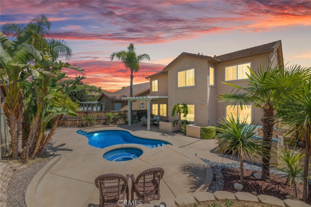 46123 Drymen Avenue Temecula, CA 92592 - Photo 30 of 42 a view of a house with backyard patio and swimming pool