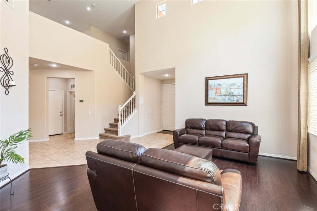 46123 Drymen Avenue Temecula, CA 92592 - Photo 9 of 42 a living room with furniture and wooden floor