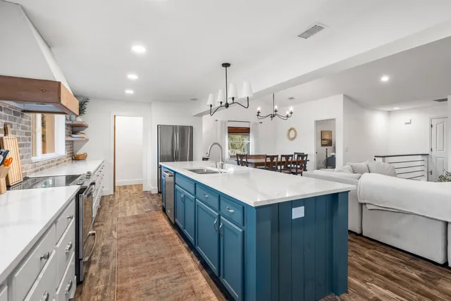 a bathroom with a sink and mirror