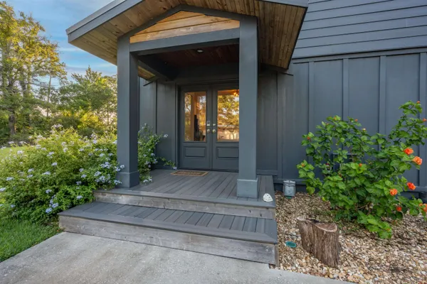 a bathroom with a tub and a shower