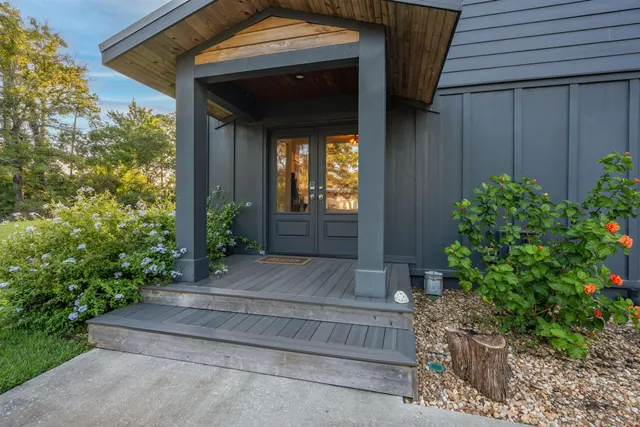 a bathroom with a tub and a shower