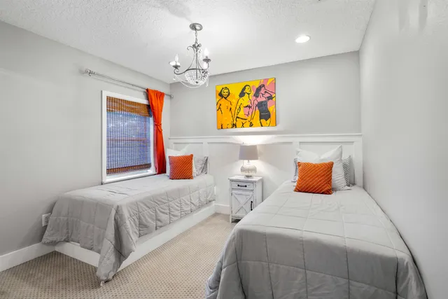 a outdoor living space with furniture and a flat screen tv