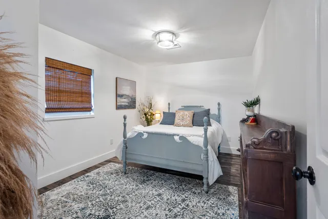 a park bench sitting in the middle of a park