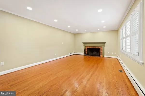 a living room with a fireplace
