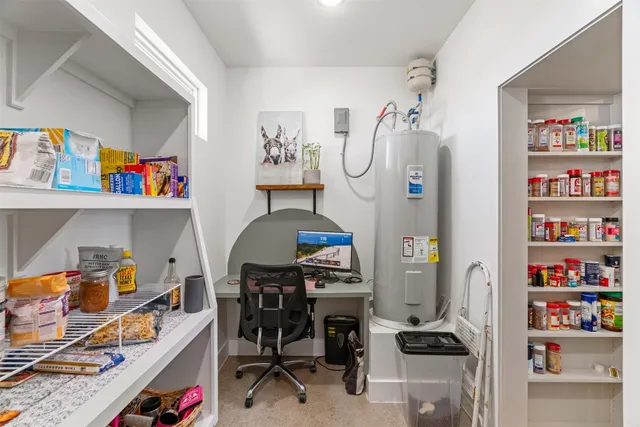 a room with furniture and storage space