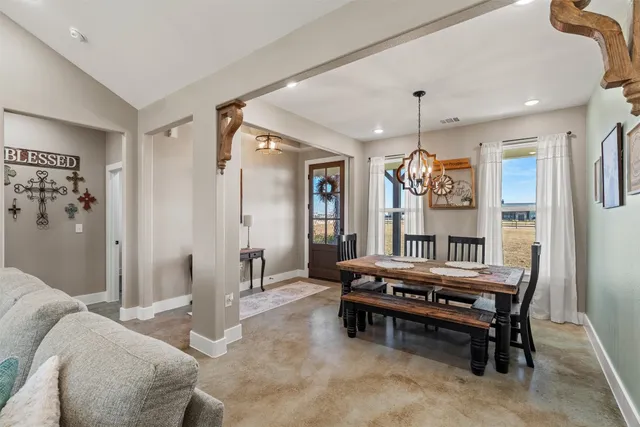 a room with furniture and window