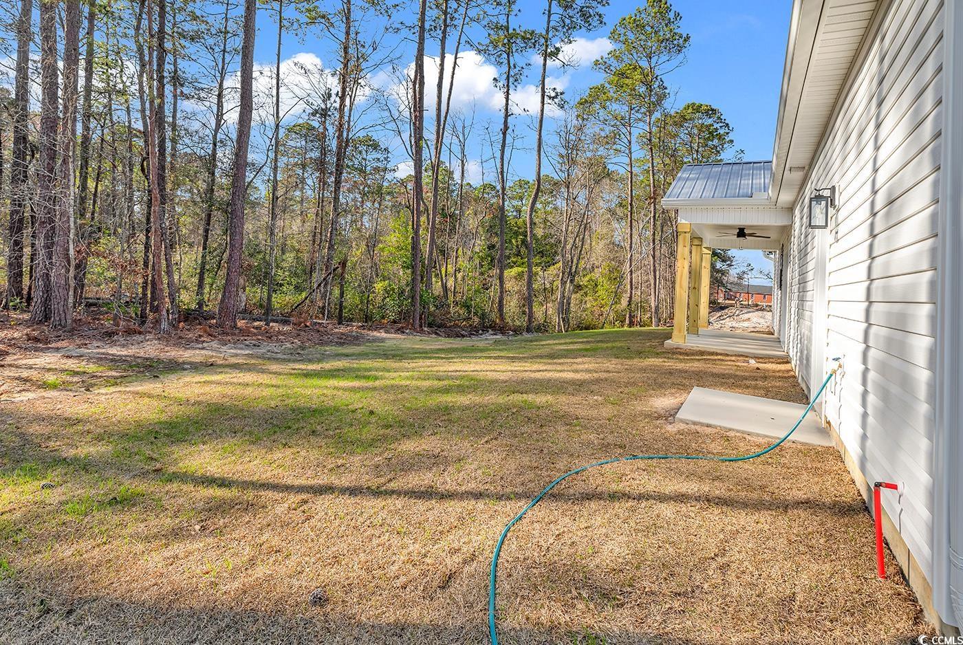 5374 Hampton Road Conway, SC 29527 - Photo 13 of 13 View of yard featuring a view of trees