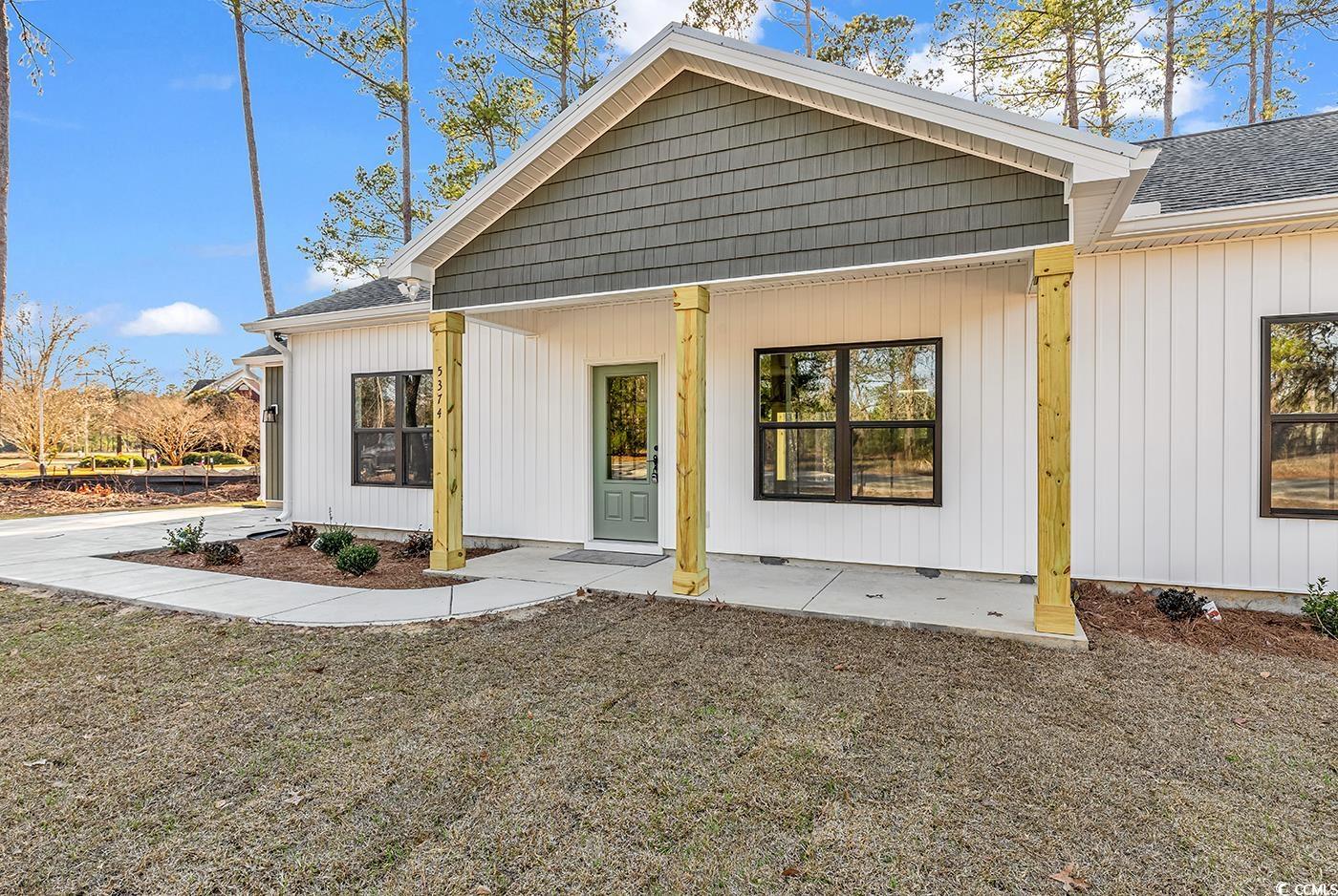 5374 Hampton Road Conway, SC 29527 - Photo 2 of 13 Rear view of property featuring a shingled roof