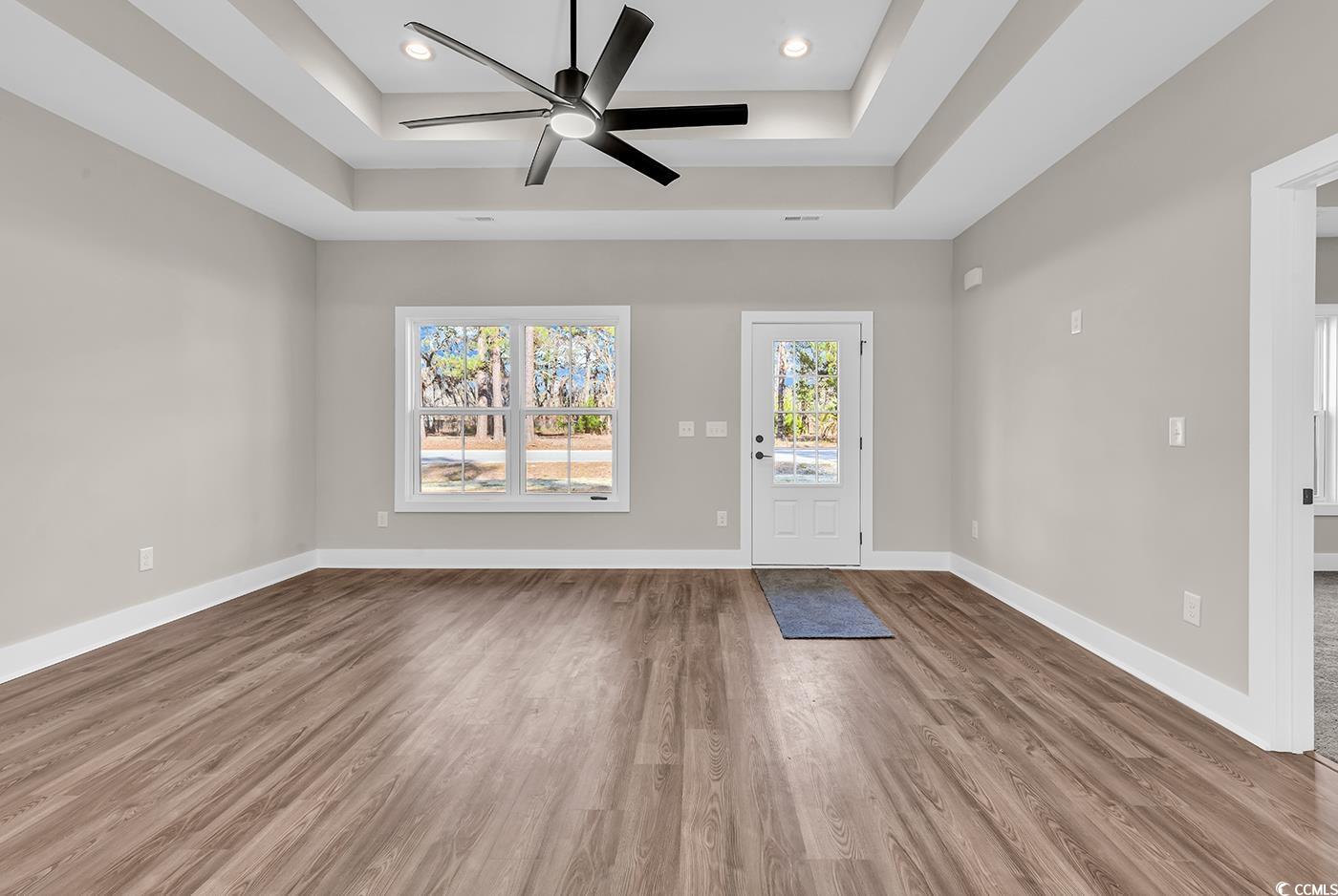5374 Hampton Road Conway, SC 29527 - Photo 5 of 13 Entryway featuring baseboards, a tray ceiling, woo