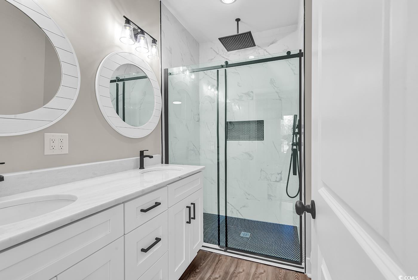 5374 Hampton Road Conway, SC 29527 - Photo 7 of 13 Full bathroom featuring double vanity, wood finish