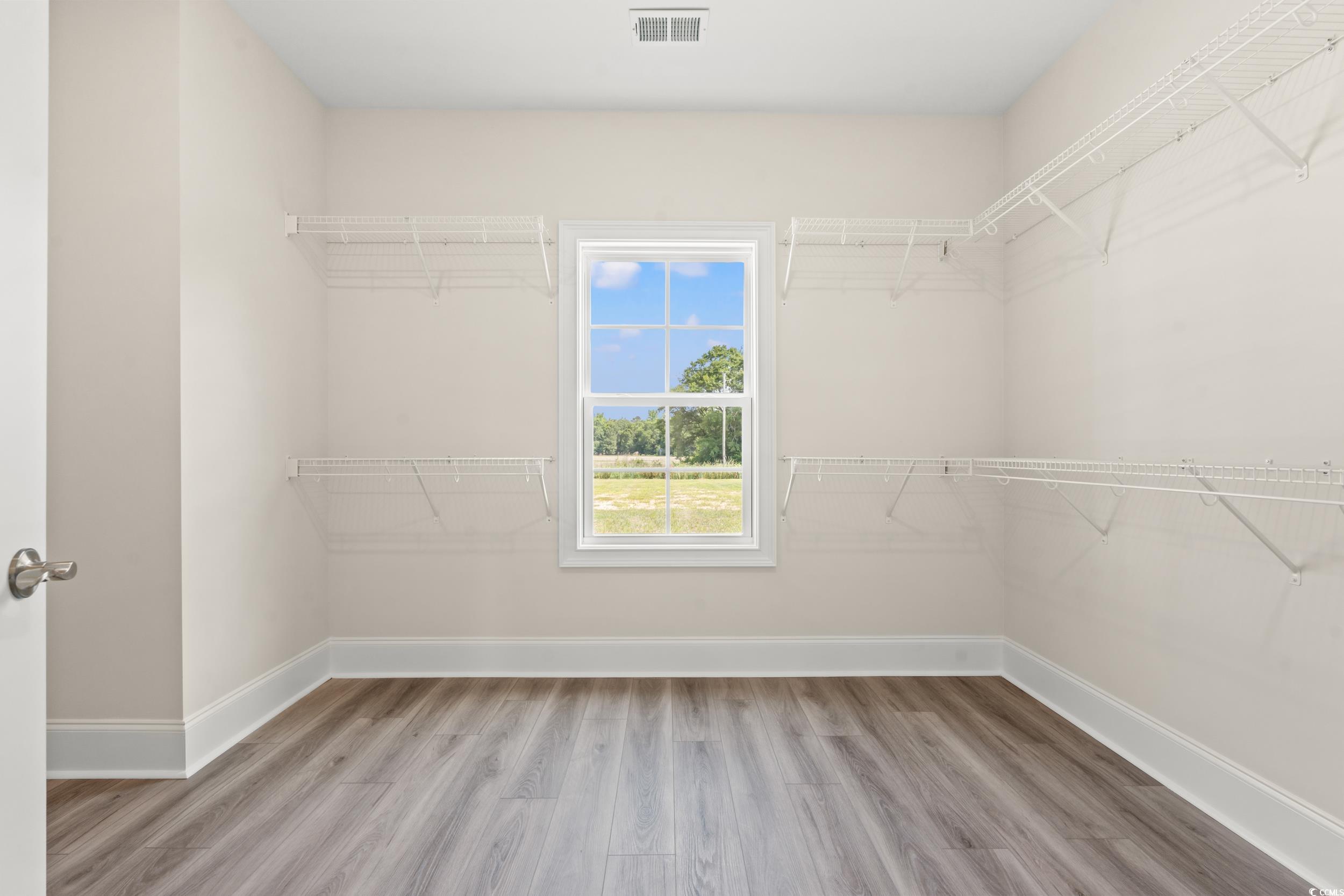 4022 Macks Road Aynor, SC 29511 - Photo 21 of 35 Spacious closet with wood finished floors