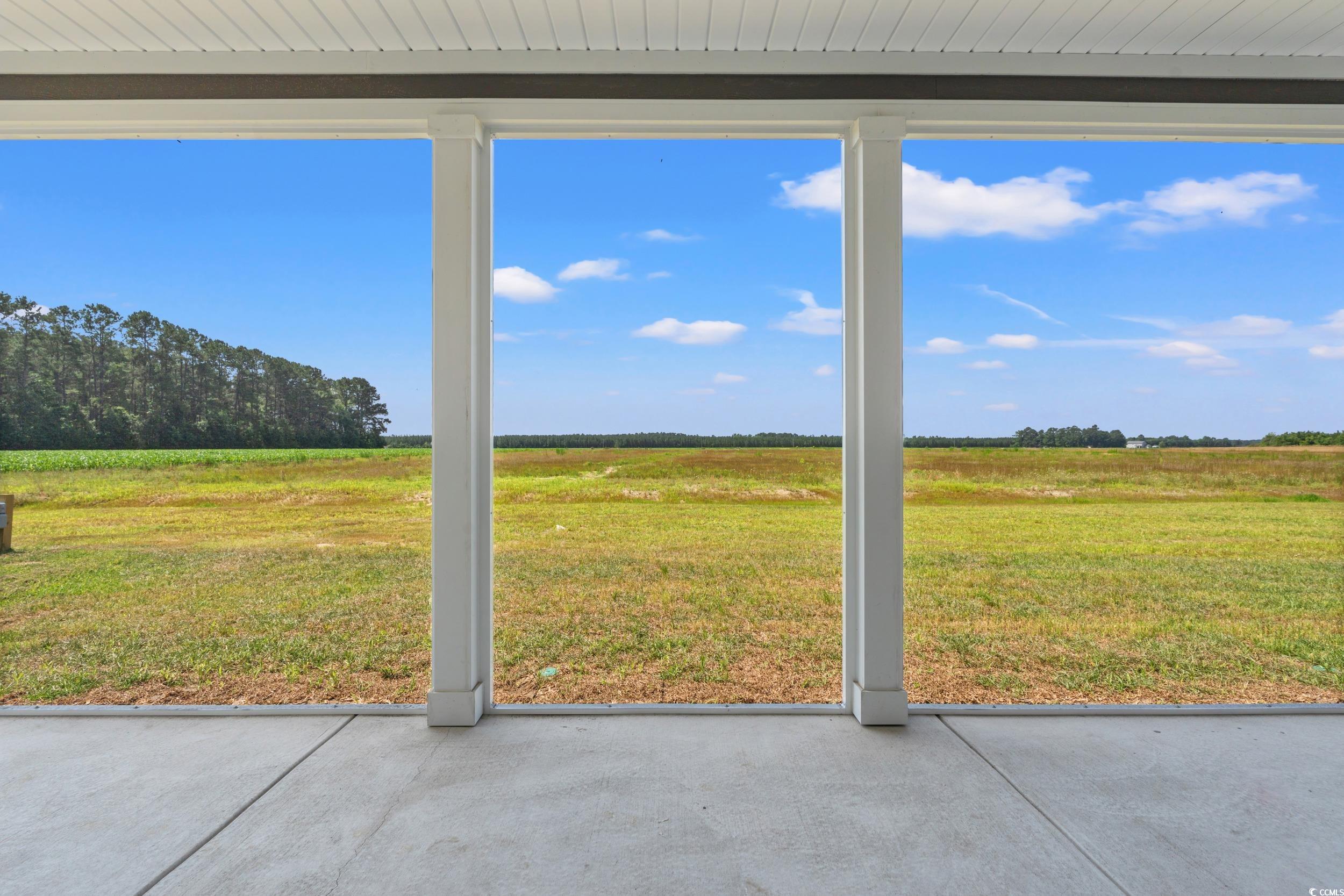 4022 Macks Road Aynor, SC 29511 - Photo 26 of 35 Unfurnished sunroom with a view of countryside