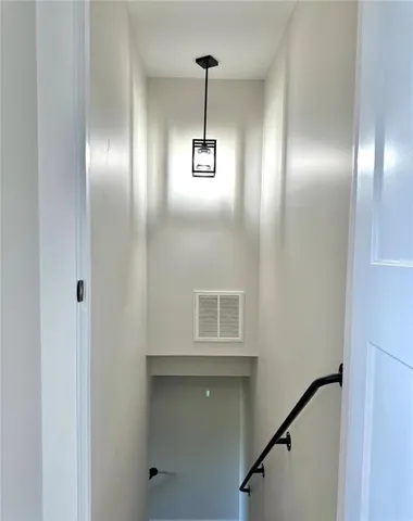 a view of empty room with windows