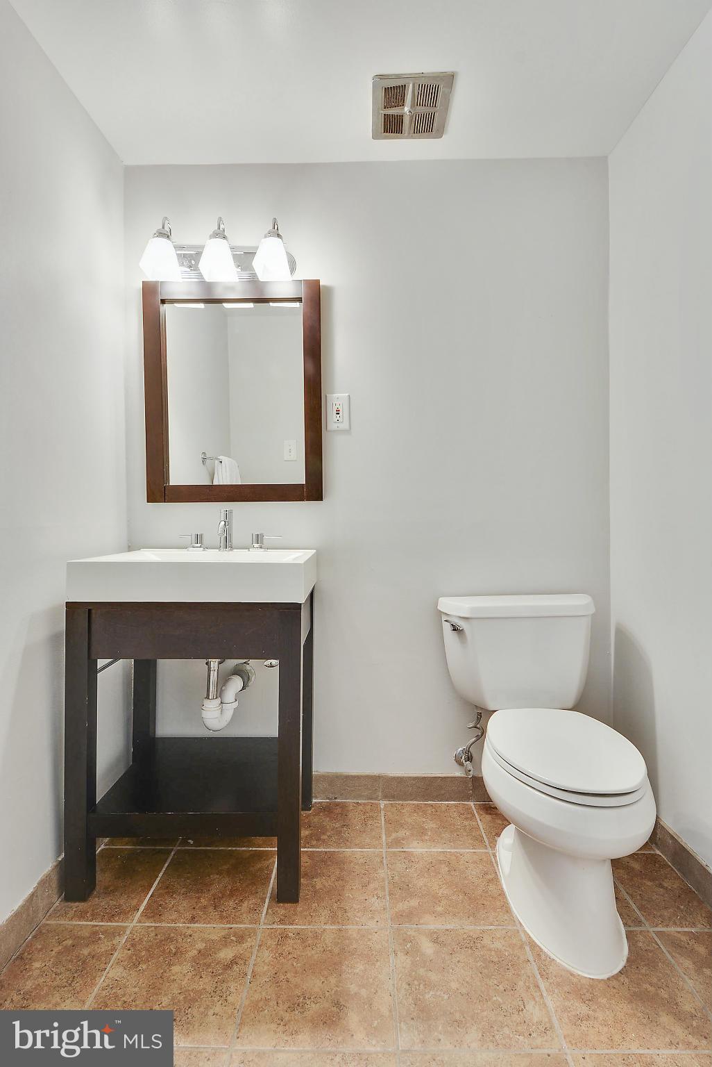11614 Vantage Hill Road, Unit 22B Reston, VA 20190 - Photo 16 of 30 Half Bath in the Master Bedroom