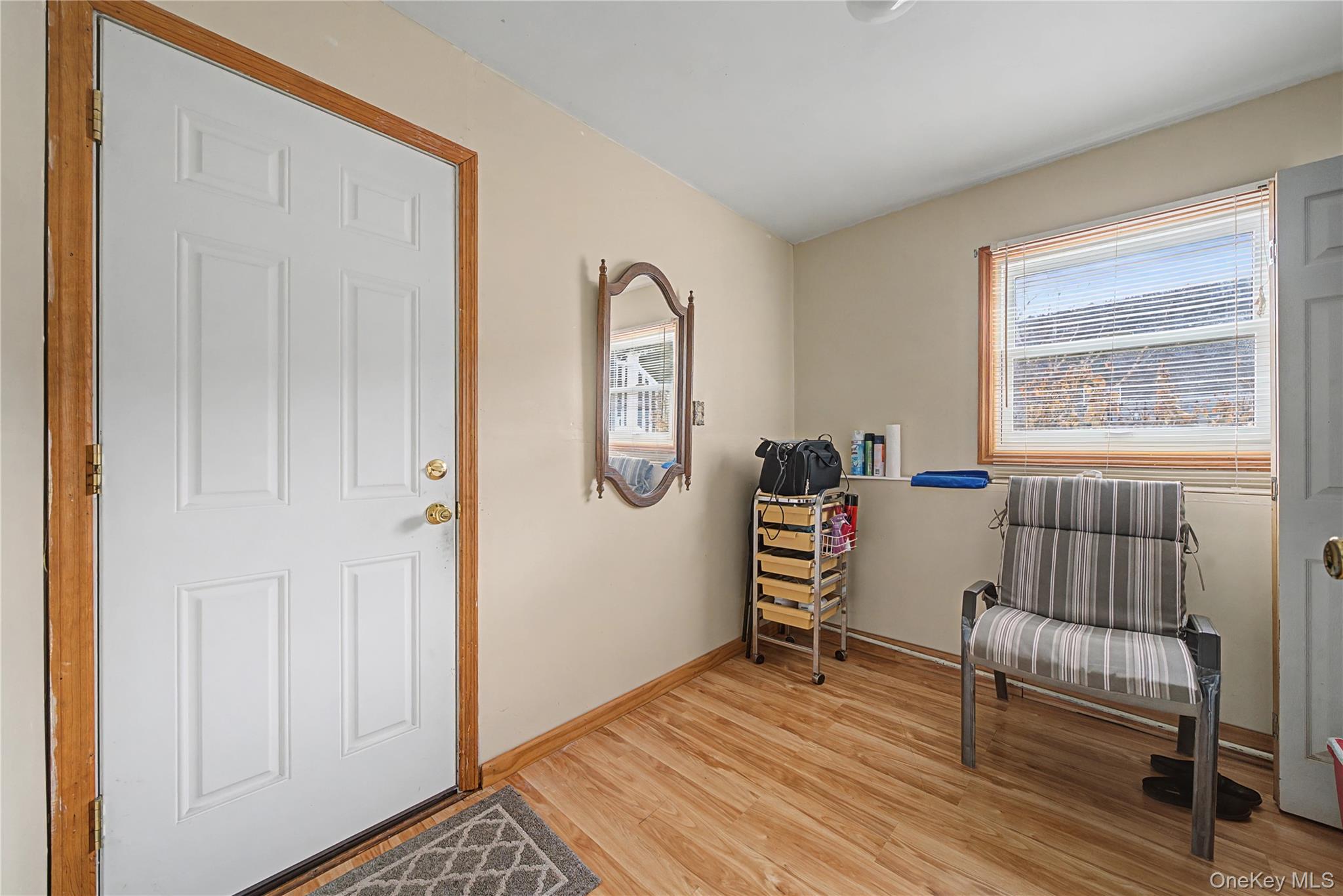6 Adams Court Monroe, NY 10950 - Photo 32 of 44 a view of room with window and wooden floor