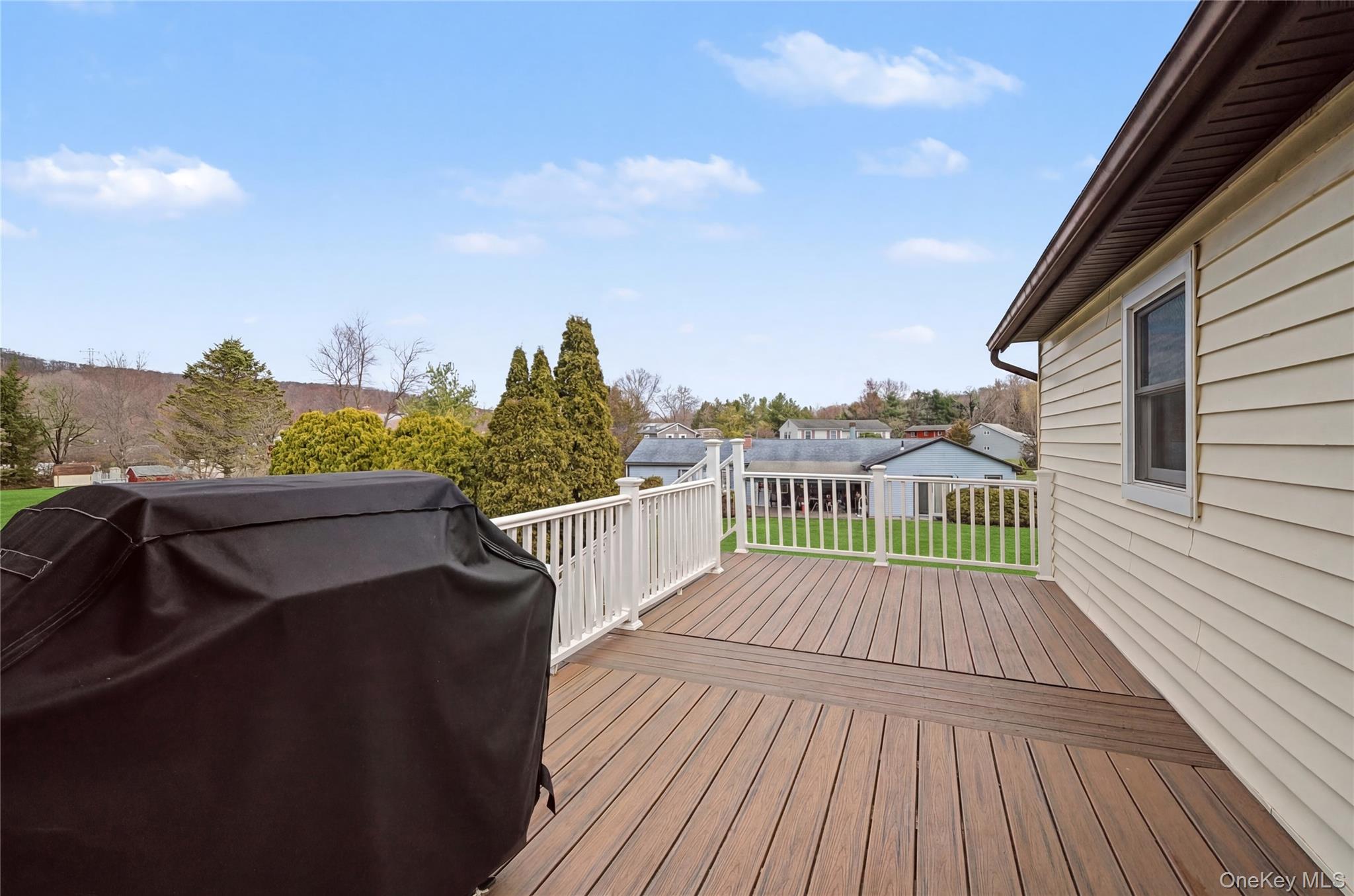 6 Adams Court Monroe, NY 10950 - Photo 34 of 44 a view of balcony with wooden floor and fence