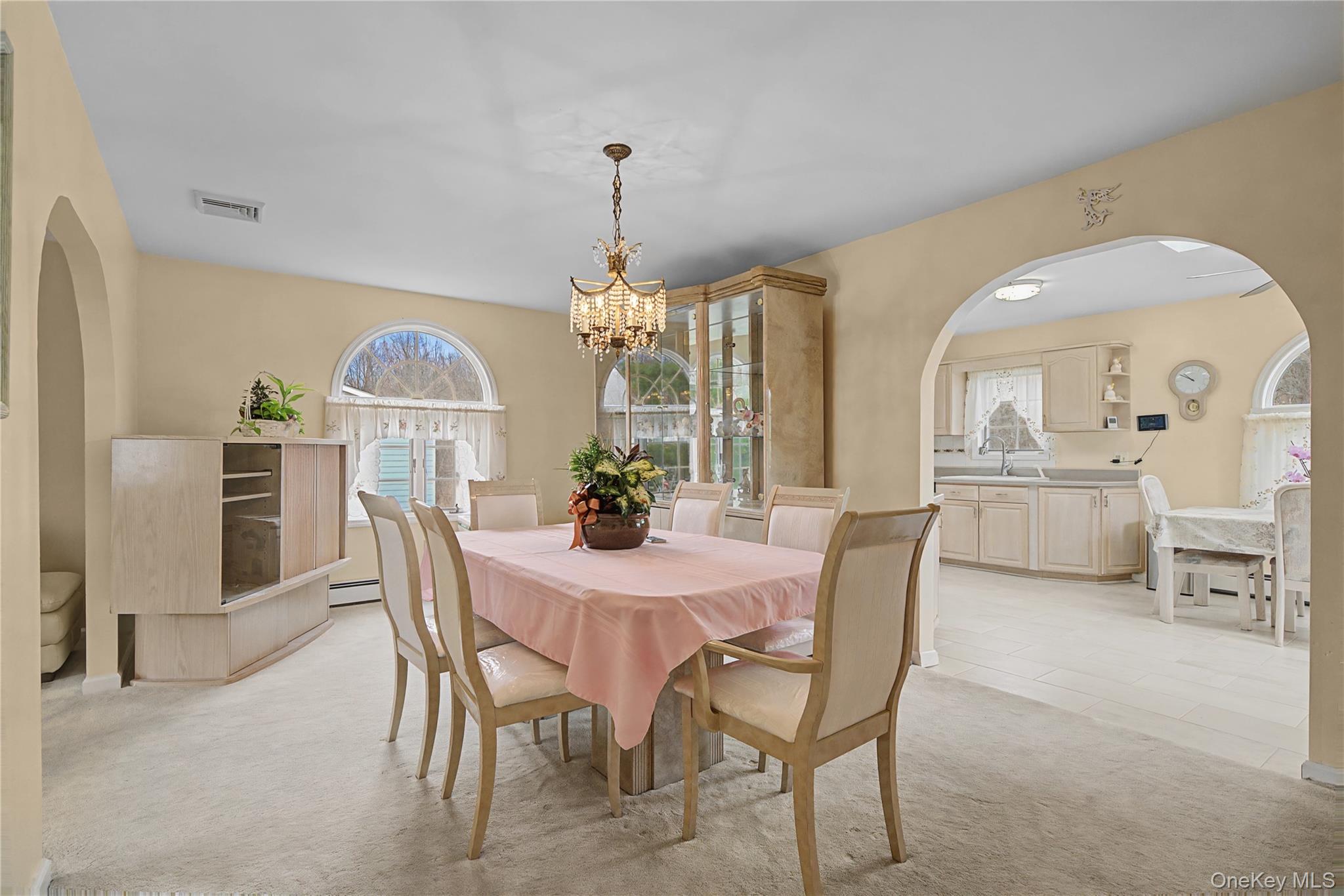 6 Adams Court Monroe, NY 10950 - Photo 9 of 44 a view of a dining room with furniture