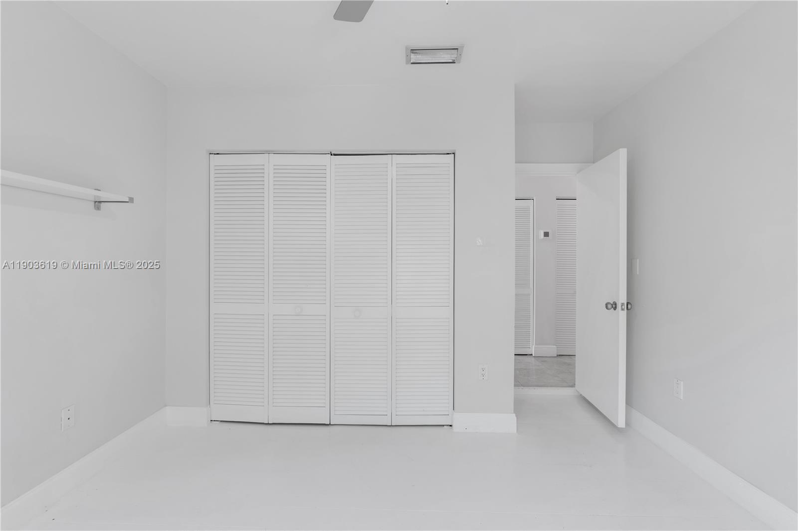 525 Ridgewood Road Key Biscayne, FL 33149 - Photo 19 of 58 a view of an empty room