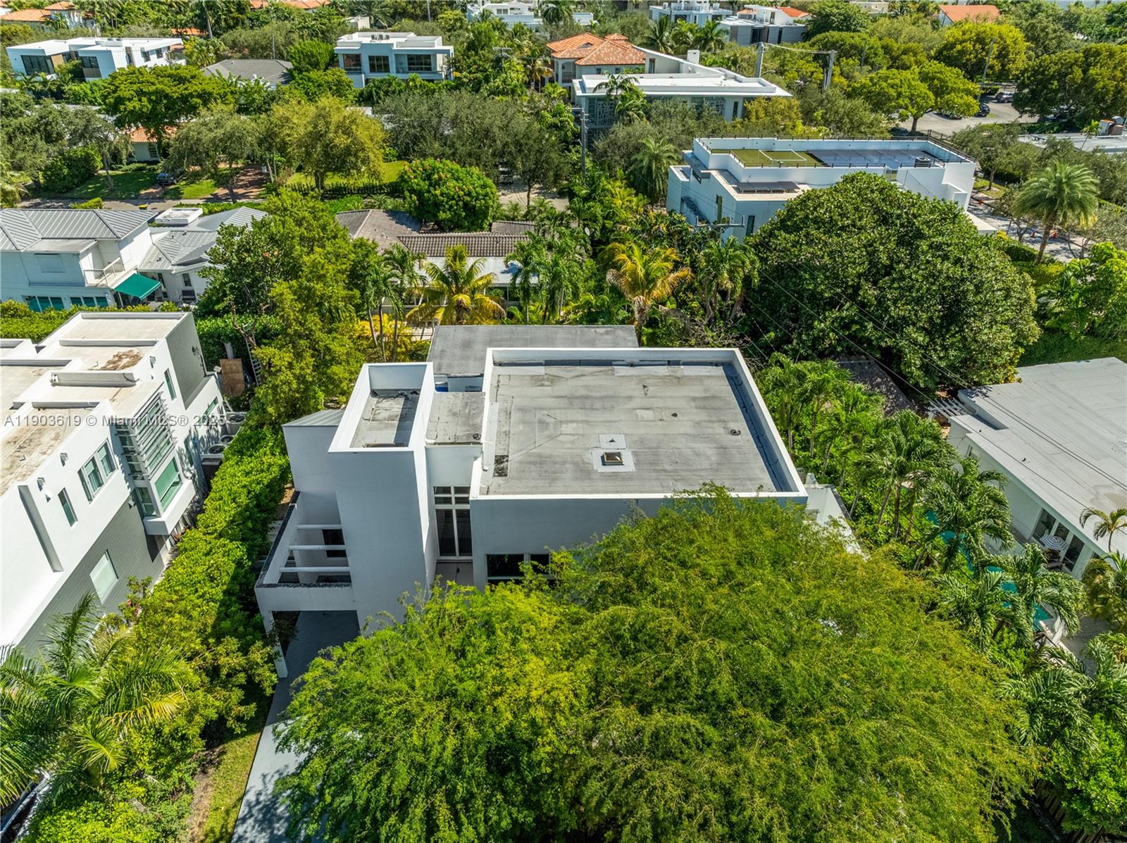 525 Ridgewood Road Key Biscayne, FL 33149 - Photo 24 of 58 an aerial view of a house with a yard