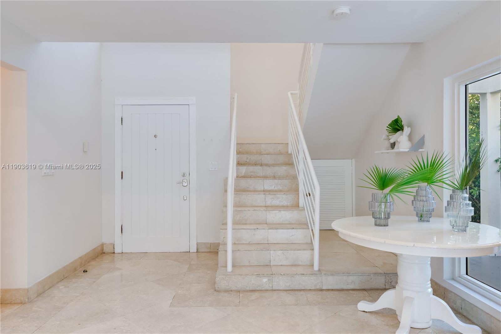 525 Ridgewood Road Key Biscayne, FL 33149 - Photo 41 of 58 a view of entryway with wooden floor