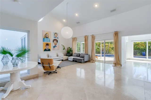 a view of livingroom with furniture and windows