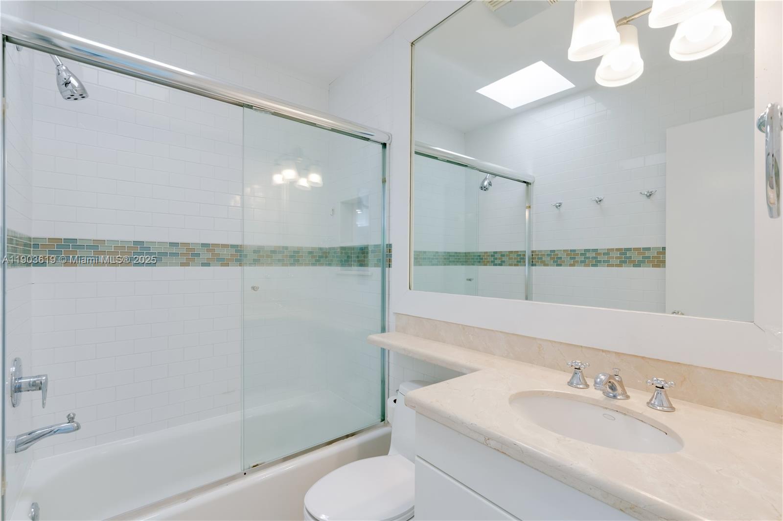525 Ridgewood Road Key Biscayne, FL 33149 - Photo 51 of 58 a bathroom with a sink toilet and shower