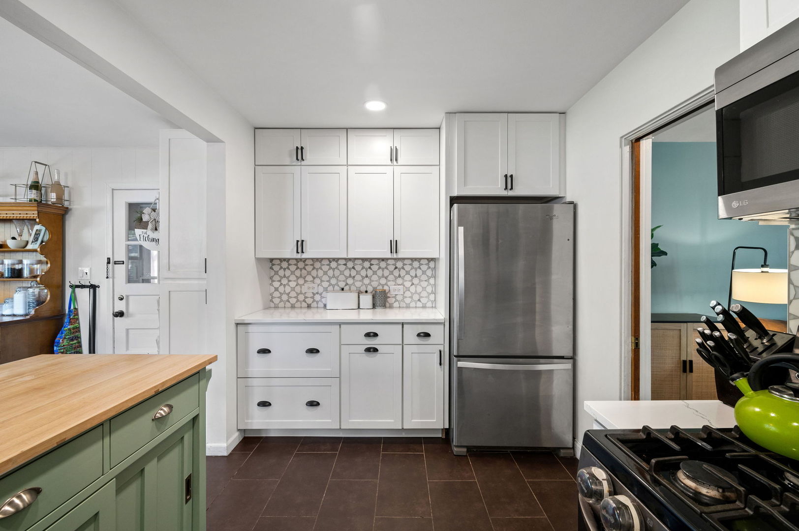 349 South Edgewood Avenue Lombard, IL 60148 - Photo 6 of 25 a kitchen with stainless steel appliances a refrigerator sink and stove