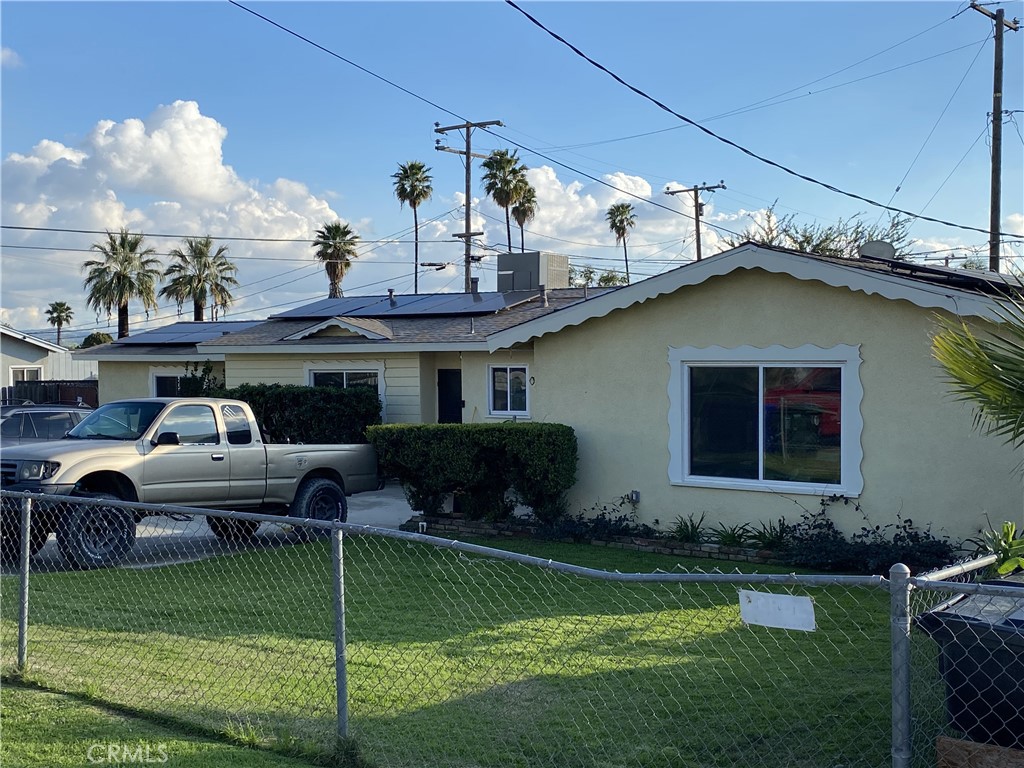 5856 Rebecca Street Riverside, CA 92509 - Photo 1 of 1 a front view of house with yard and outdoor seating