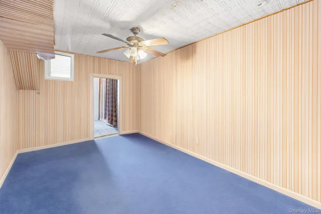 a bathroom with a sink vanity mirror and shower