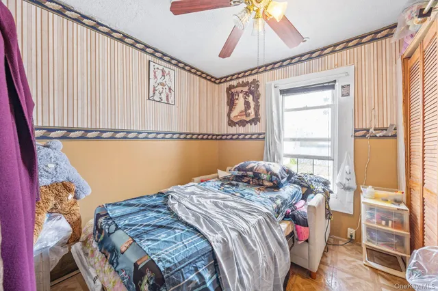 a view of a patio with table and chairs with wooden floor and fence